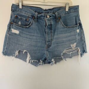 Levi’s 501 high waisted button fly distressed denim shorts in size 32